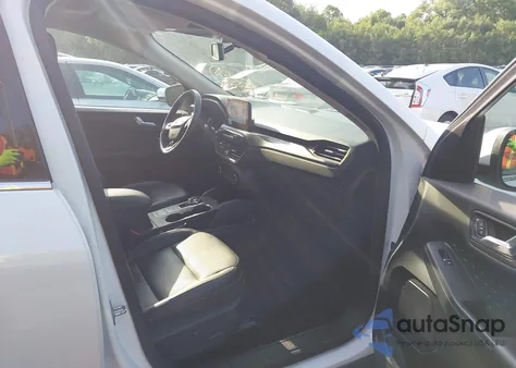 2020 Ford Escape Titanium z USA, uszkodzony, nr VIN 1FMCU9DZ0LUA76423